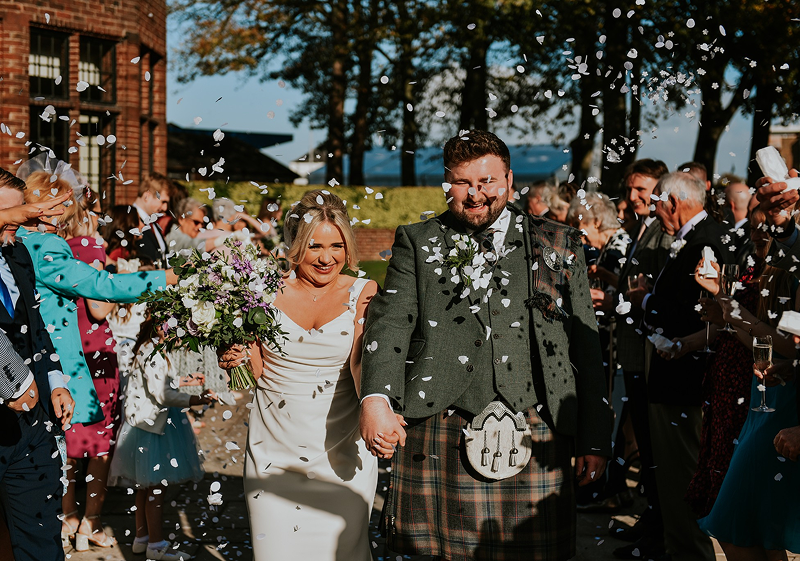 Confetti moment for the newlyweds at Western House Hotel surrounded by guests celebrating