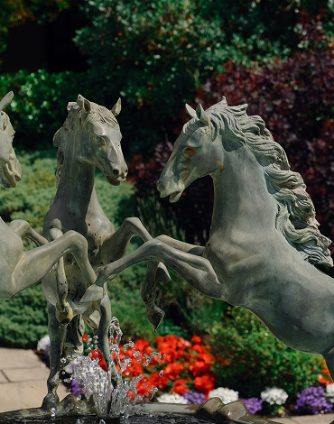 Stone horse fountain in the landscaped gardens at Western House Hotel in Ayrshire.