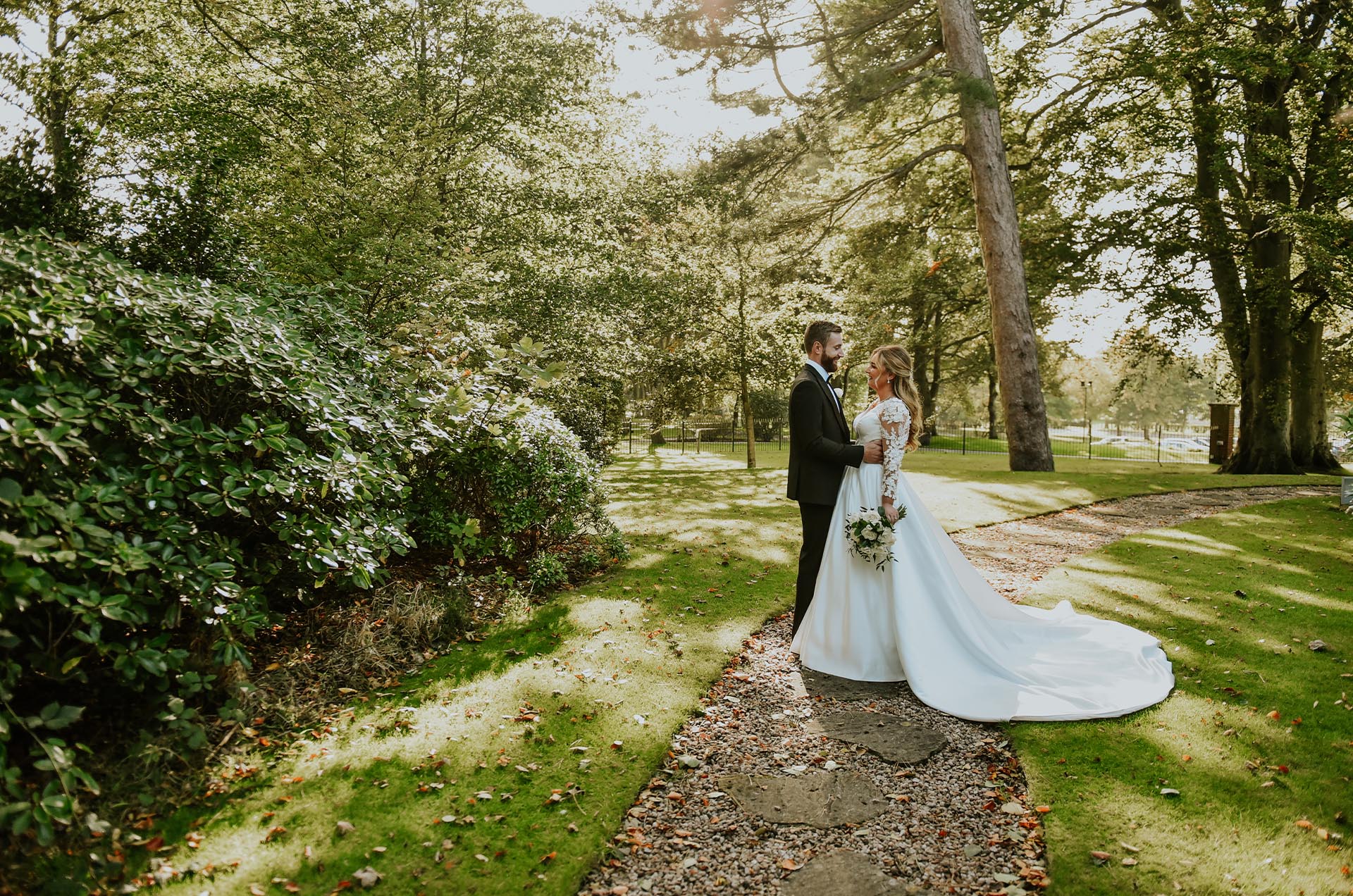 Romantic newlywed moment captured in the gardens of Ayrshire wedding venue