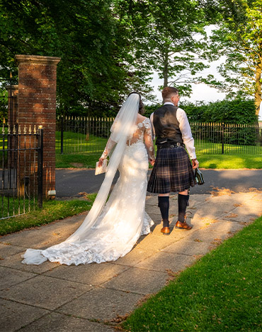 Bride and groom enjoying a moment together in the gardens at Western House Hotel